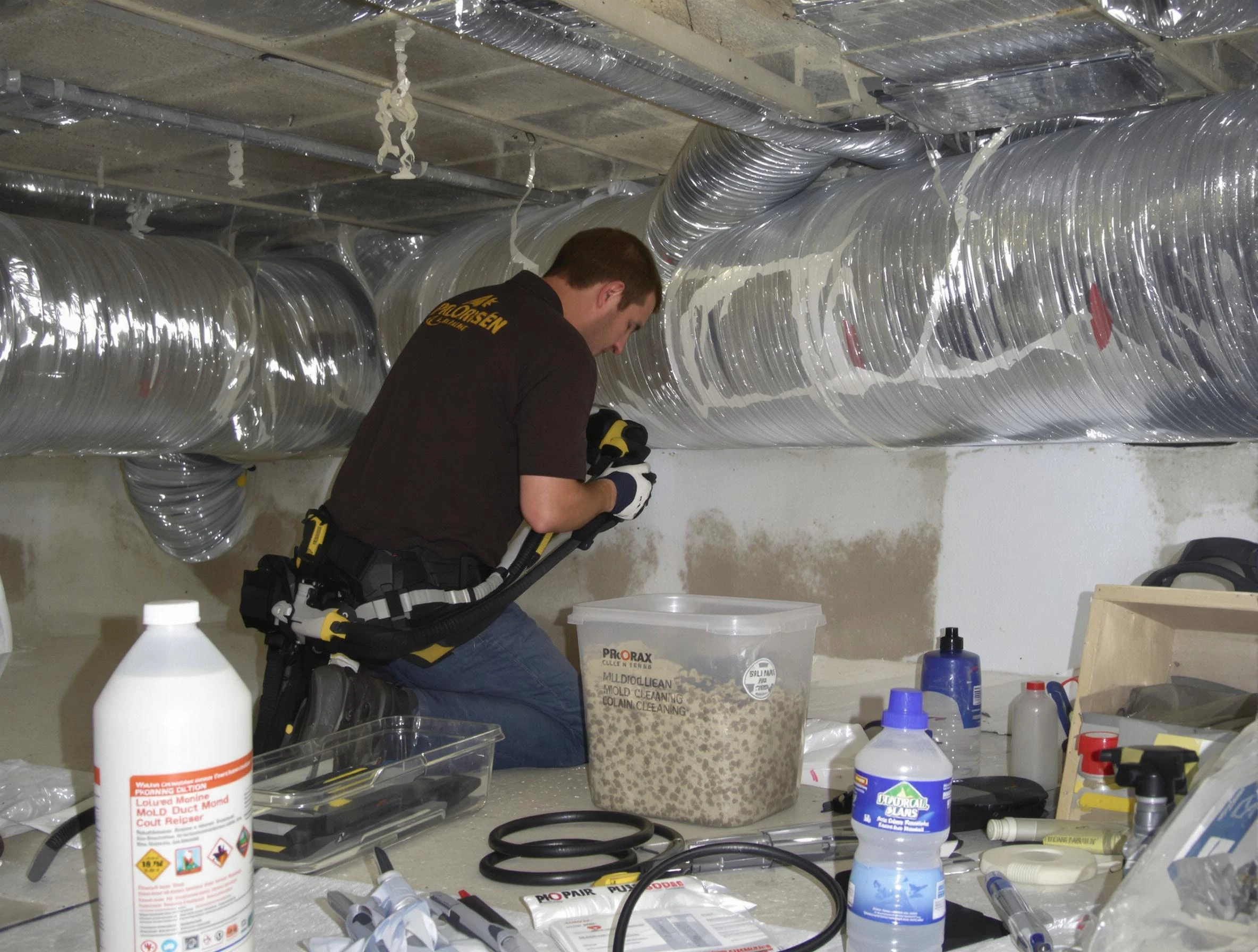 Somerville Air Duct Cleaning specialist performing professional mold removal from air ducts in Somerville